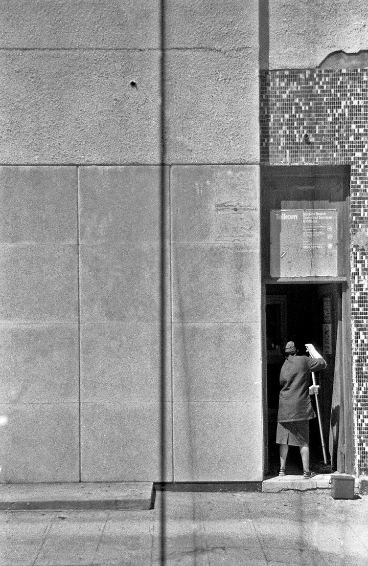 This diptych is inspired by American photographer, Gordon Parks. A photograph of Ella Watson standing with a broom and a mop in front of the American flag (ii)